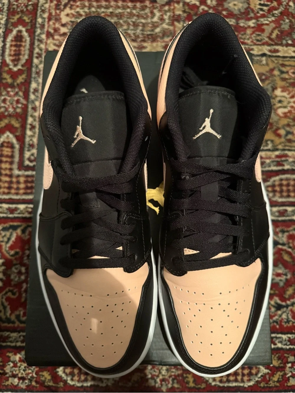 Jordan 1 Low Crimson Tint Sneakers in Black & Peach